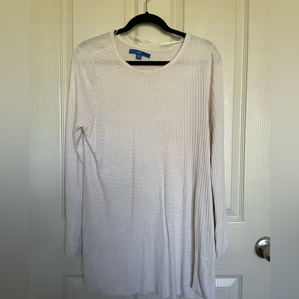 White sweater.